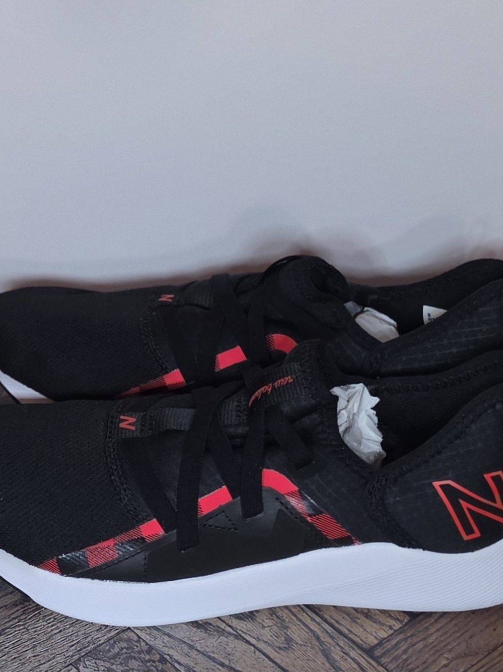 New Balance Black Sneakers with Red Accents